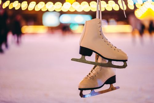 Close-Up Of Ice Skates Hanging In Rink