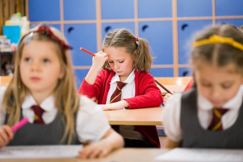 Little Girl Struggling With School Work