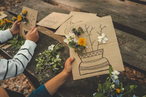 Children doing a springtime craft together, symbolizing focus, regulation, and expression supported by sensory regulation therapy in NYC.